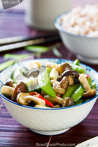 Image of Stirred fried pea with mushroom