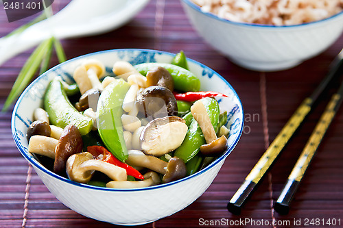 Image of Stirred fried pea with mushroom