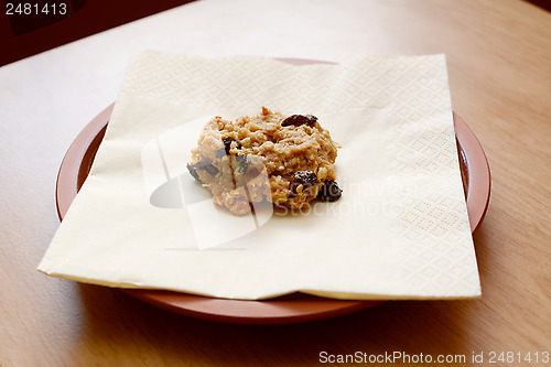 Image of Freshly baked oatmeal raisin cookie