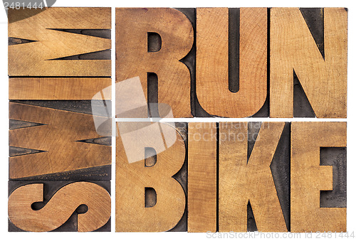 Image of run, bike, swim - triathlon concept