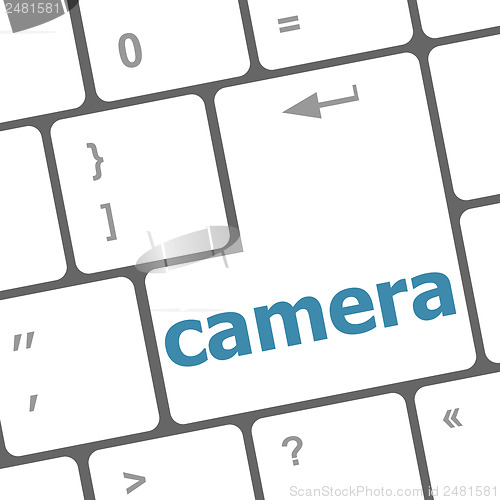 Image of camera word on keyboard key, notebook computer button