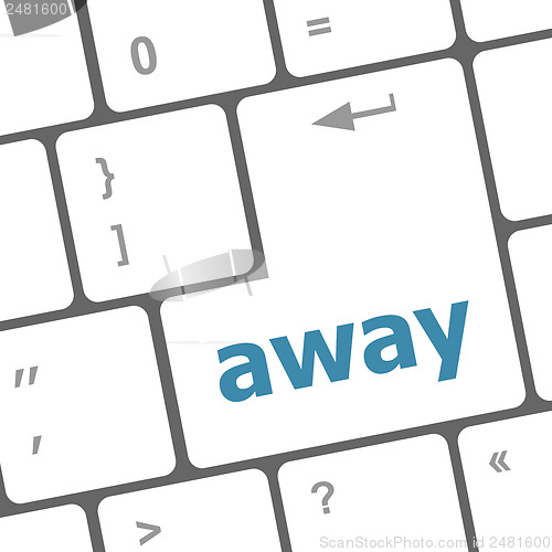 Image of away word on keyboard key, notebook computer