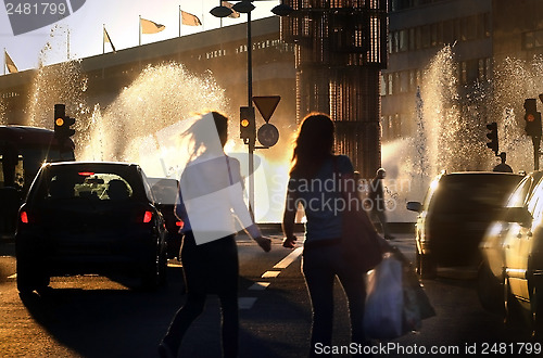 Image of Young people crossing street