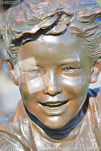 Image of School kid statue.