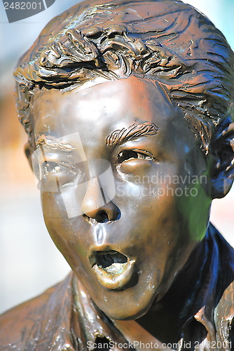 Image of School kid statue.