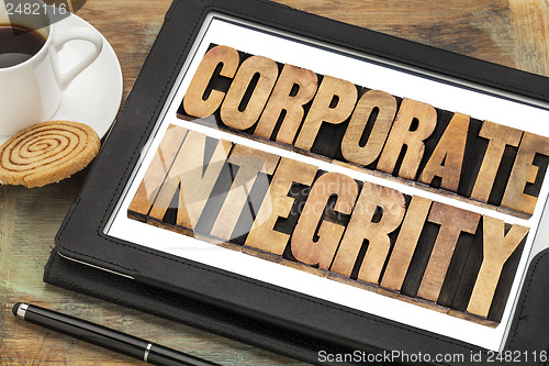 Image of corporate integrity on digital tablet