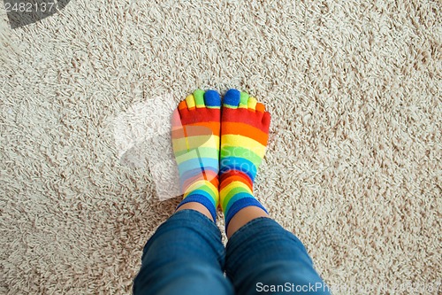 Image of legs in striped socks