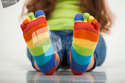 Image of legs in striped socks