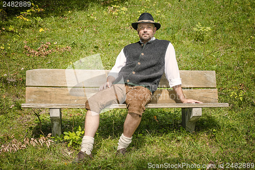 Image of Bavarian man on bench