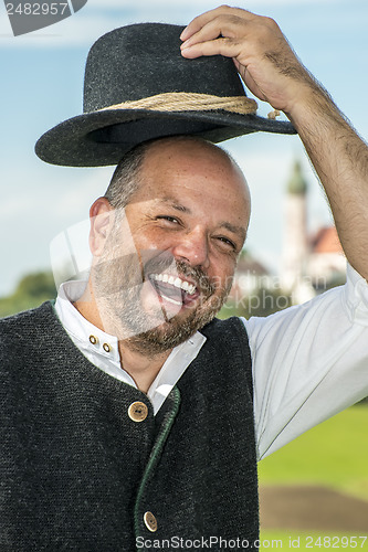 Image of Laughing traditional bavarian man