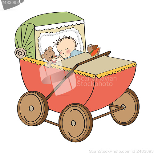 Image of baby boy in retro stroller isolated on white background