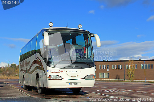 Image of Scania Coach Bus on a parking lot in Paimio, Finland