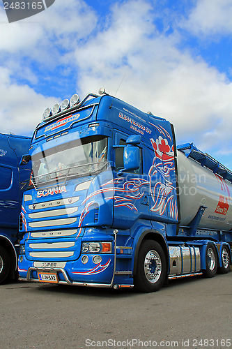 Image of Blue Scania Truck, Detail with Blue Sky and Clouds