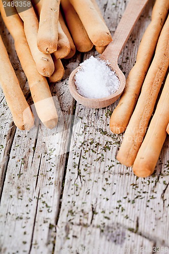 Image of bread sticks grissini with rosemary and salt 