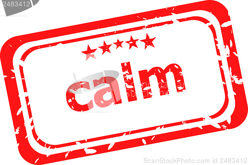 Image of calm on red rubber stamp over a white background