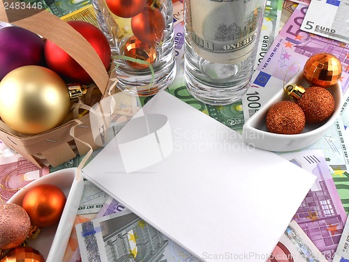 Image of new year celebration event, money wallpaper, christmas balls and blank paper