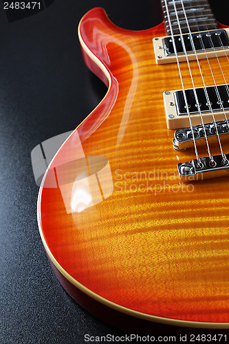 Image of Cherry sunburst electric guitar