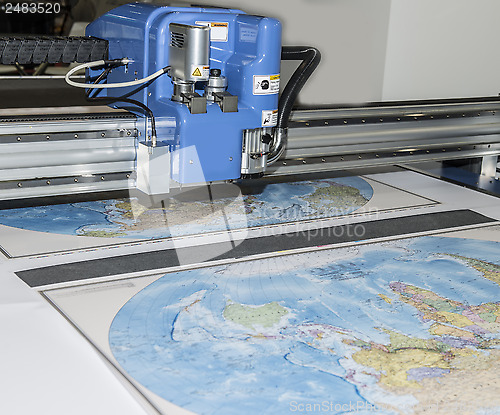 Image of Plotter plotting some map