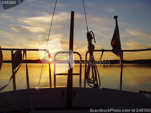 Image of Sailboat in a sunset,