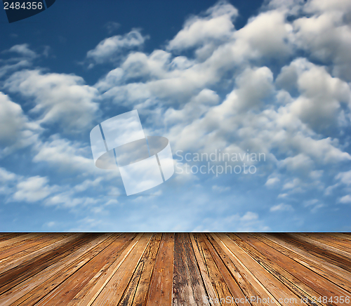Image of beautiful sky backdrop and wooden floor
