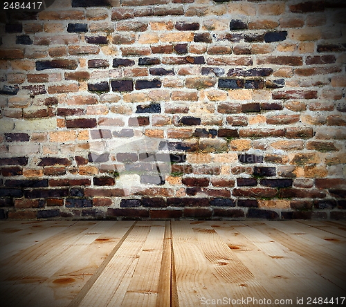 Image of cracked interior wood floor