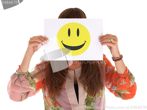 Image of Young woman holding paper with happy smiley