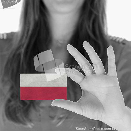 Image of Woman showing a business card