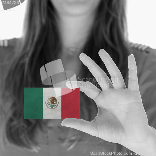 Image of Woman showing a business card