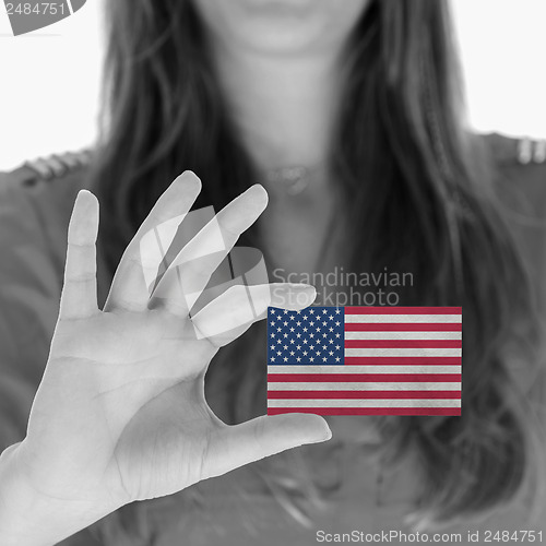 Image of Woman showing a business card