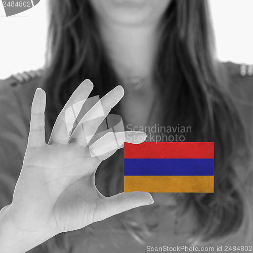 Image of Woman showing a business card