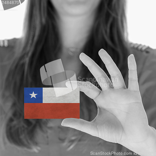 Image of Woman showing a business card