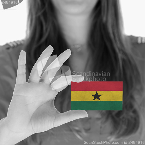 Image of Woman showing a business card