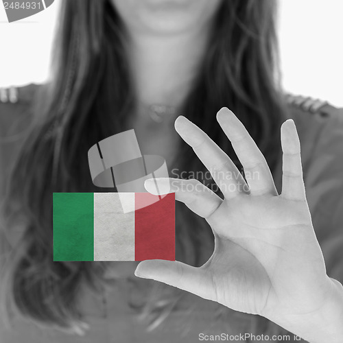 Image of Woman showing a business card
