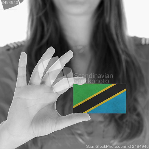 Image of Woman showing a business card