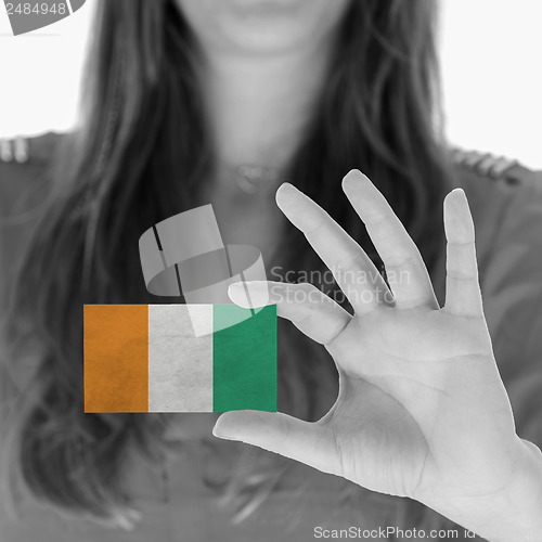 Image of Woman showing a business card