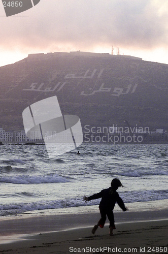 Image of child on the beach in Morocco