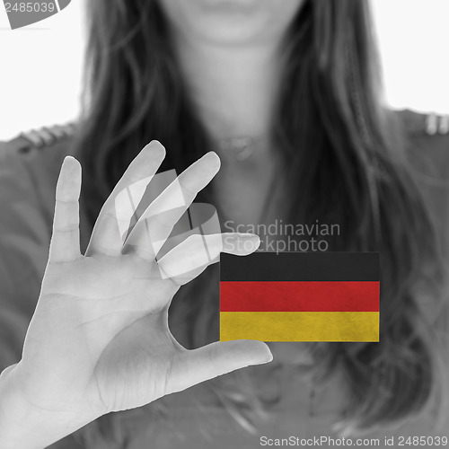 Image of Woman showing a business card