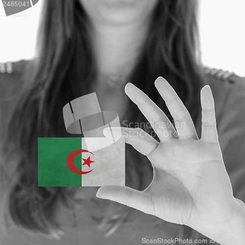 Image of Woman showing a business card