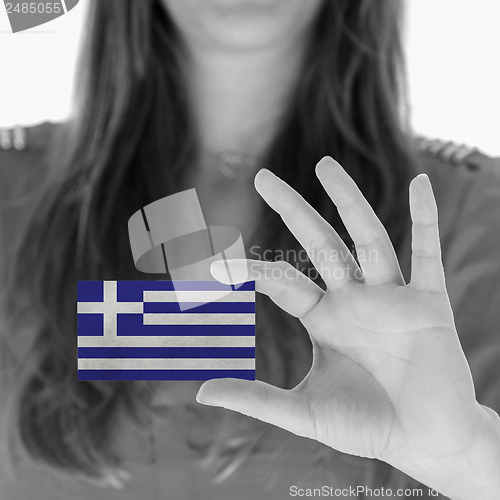 Image of Woman showing a business card