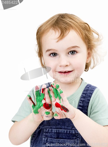 Image of cute girl with finger paint