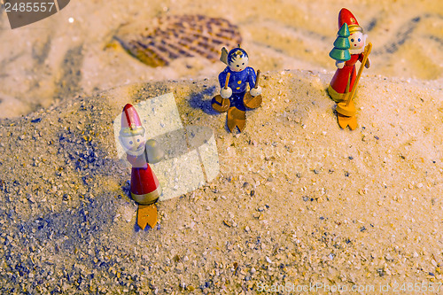 Image of Santa Claus during sandboarding