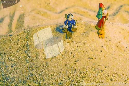 Image of Santa Claus during sandboarding