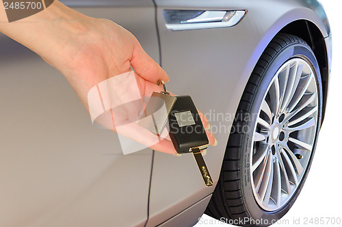 Image of Elegant woman's hand holding car keys