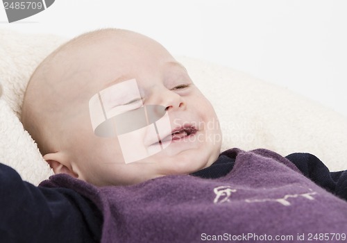 Image of smiling young child in light background