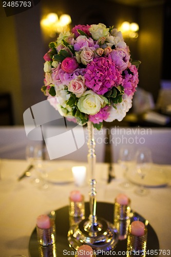 Image of Celebratory tables decorated with flowers