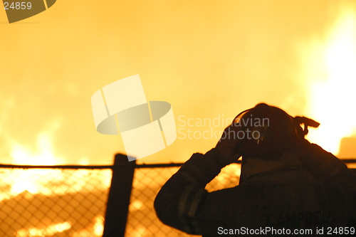 Image of firefighter in silhouette