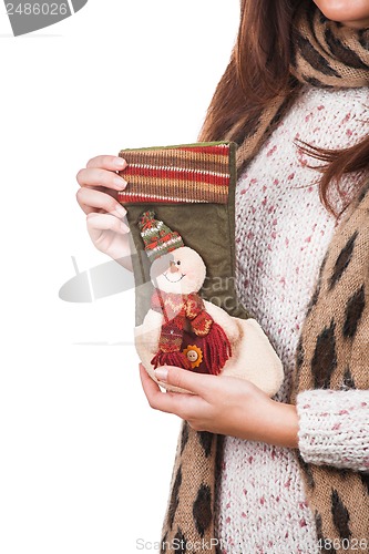 Image of Girl holding Christmas sock