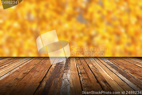 Image of wooden terrace with view to the autumn forest