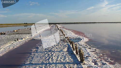 Image of landscape of extraction of salt with sun