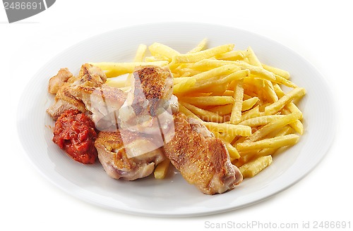 Image of grilled chicken and french fries